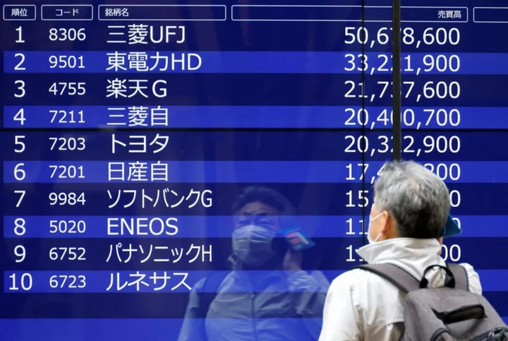 Stocks slip, yen surges on speculation of Bank of Japan policy tweak