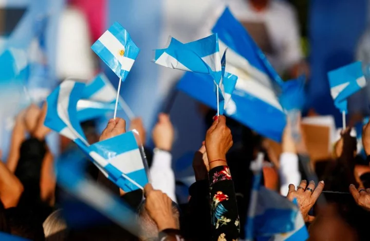 Analysis-Dollarization, devaluation, debt: potential traps for Argentina investors