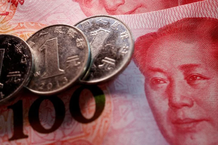 Exclusive-China's state banks seen selling dollars offshore to slow yuan declines - sources