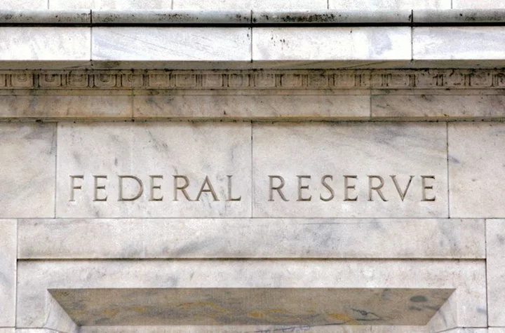 Fed policymakers see 5.1% policy rate at end of 2024