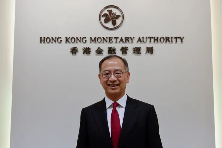 HKMA ups rates, matching Fed, says banks' bad loans remain steady