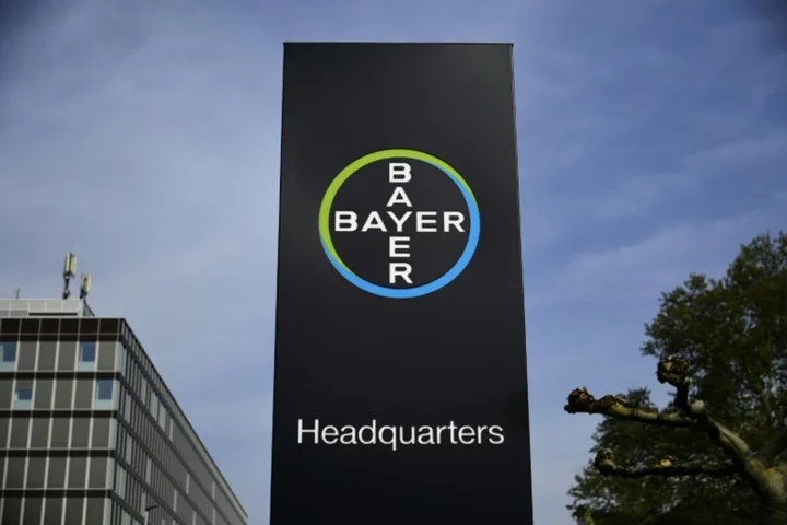 Chemical giant Bayer to cut management jobs after huge loss
