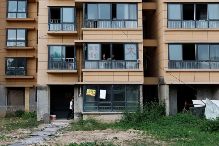Broken dreams, shattered families in China's unfinished apartments